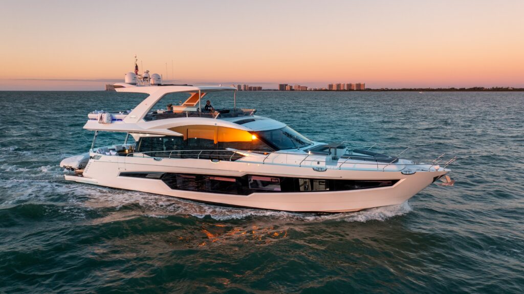 Exclusive Yachts - Time 4 U yacht on water with skyline in background sunset