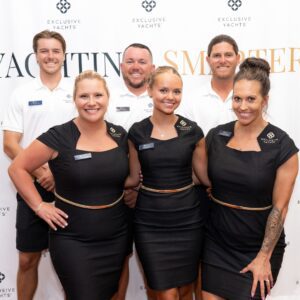 Exclusive Yachts Launch Party - The EY Crew at Naples Sailing & Yacht Club - step and repeat photo