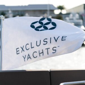 Exclusive Yachts Launch Event - The EY flag flying on the back of a yacht