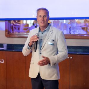 Exclusive Yachts Launch Party - CEO Scott Stuckmann speaking at the Naples Sailing & Yacht Club -