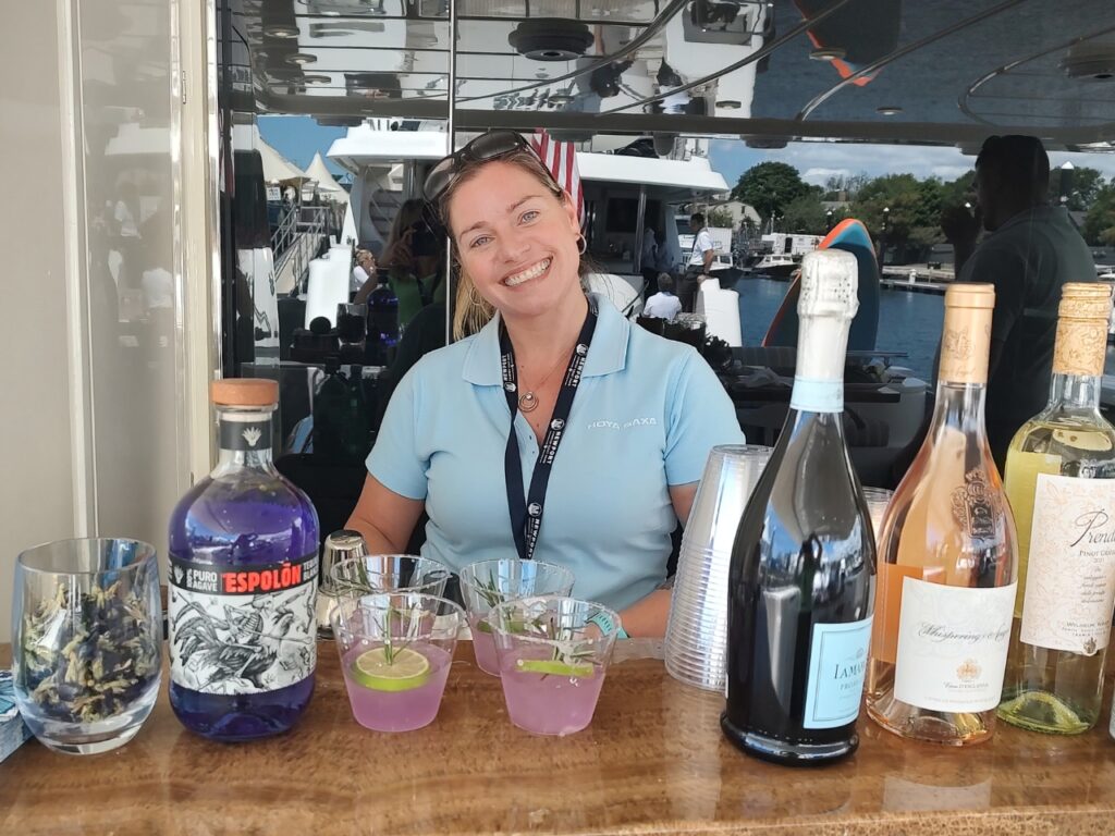 Exclusive Yachts - Newport Charter Show Sterwardess aboard M/Y Hoya Saxa