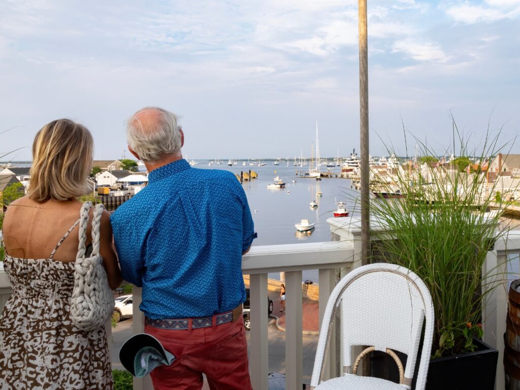 Exclusive Yachts - Couple looking into ocean at Nantucket