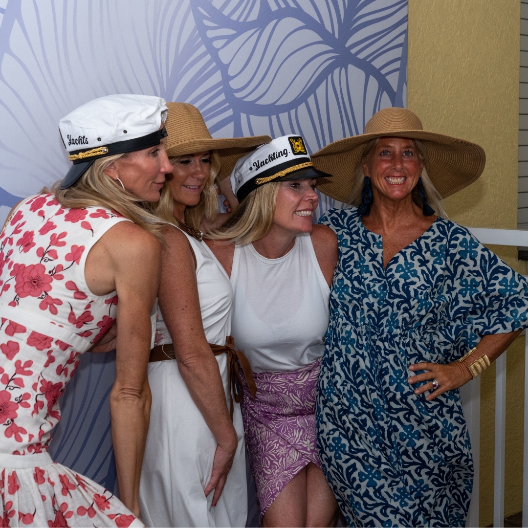 Excluisve Yachts - People wearing hats at a party