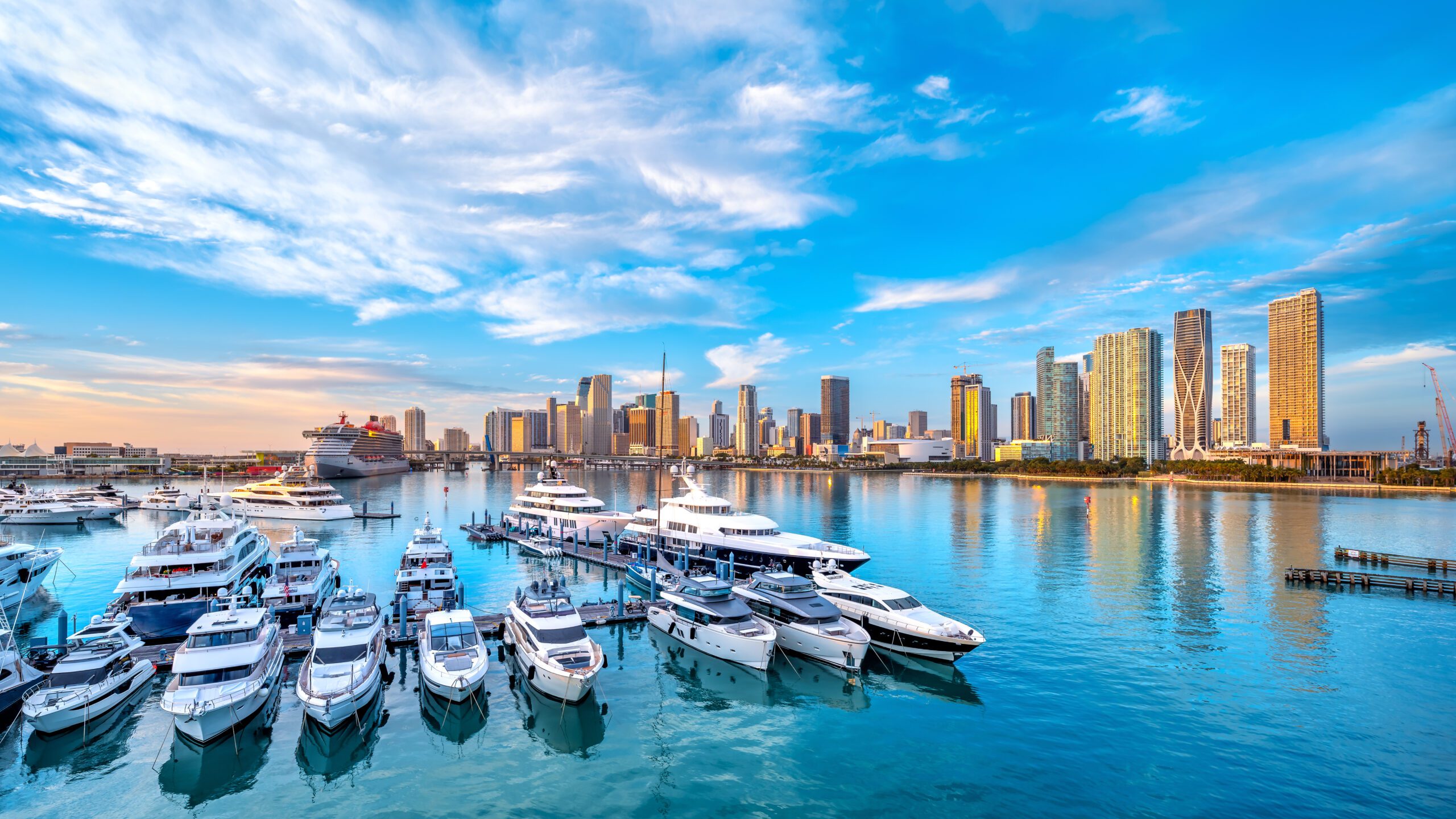 Exclusive Yachts - the skyline of miami during sunrise, florida