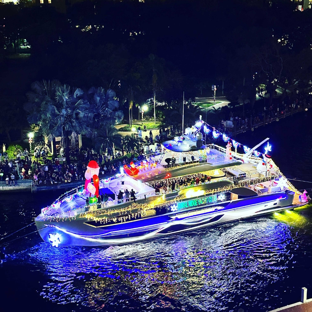 Exclusive Yachts - 11' Freedom Horizon lit up for the Winterfest Parade