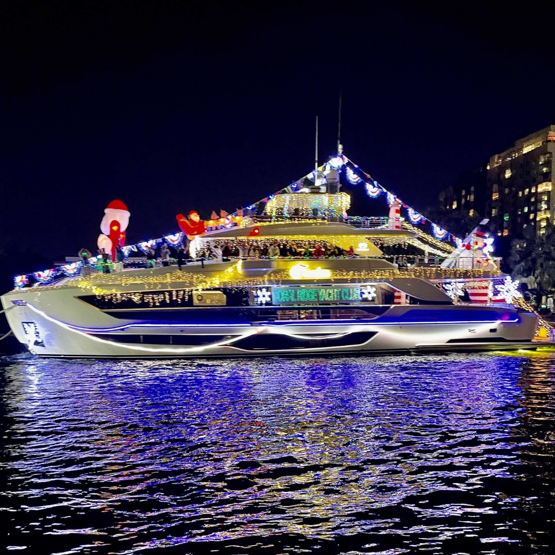 Exclusive Yachts - 11' Freedom Horizon lit up for the Winterfest Parade