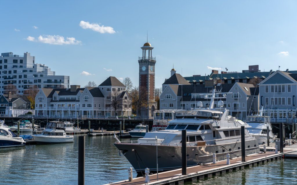 View of harbor boats and yacht, Clock tower in marina bay, Boston massachusetts. Exclusive Yachts