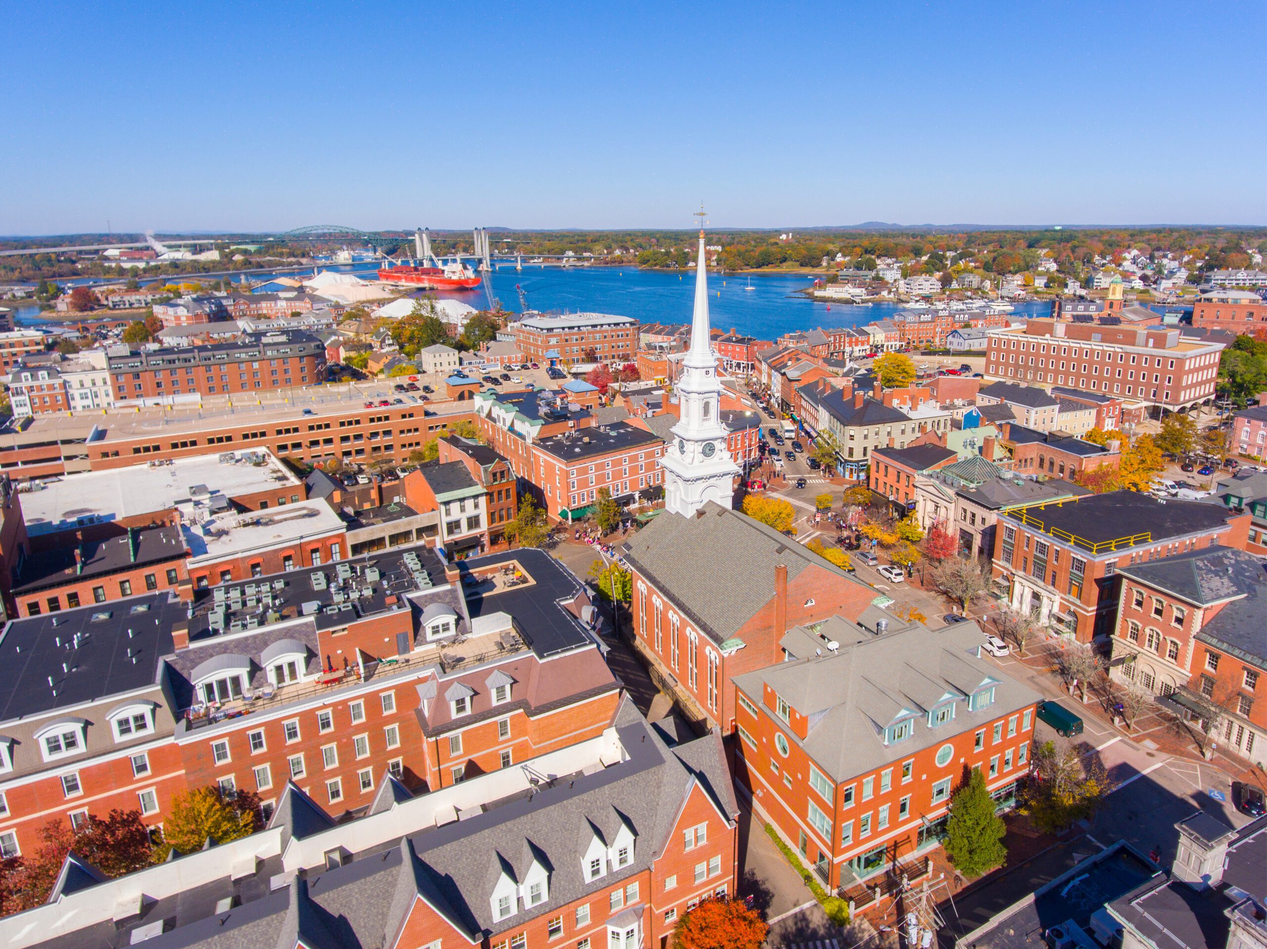 Portsmouth historic downtown aerial view at Market Square with historic buildings and North Church on Congress Street in city of Portsmouth, New Hampshire NH, USA. View of ocean adn portsmouth. Exclusive yachts